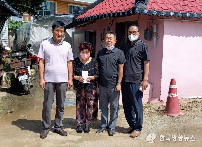 고덕면 이장협의회 침수피해 복구 기금 전달